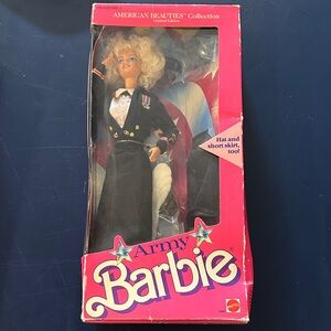 Barbie in Black Military-Inspired Ensemble with White Blouse